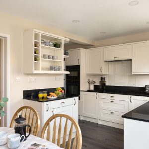 cream shaker kitchen with shelving